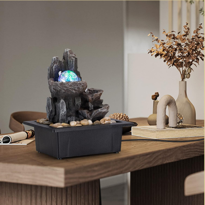 Finn – Dekorativer Zimmerbrunnen mit LED-Lichtkugel und Felsen-Design