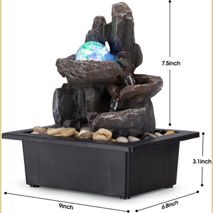 Finn – Dekorativer Zimmerbrunnen mit LED-Lichtkugel und Felsen-Design